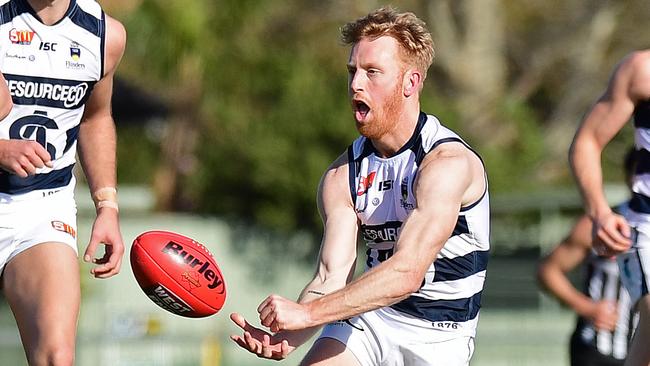 South's Nick Liddle fires out a handball. Picture: Tom Huntley