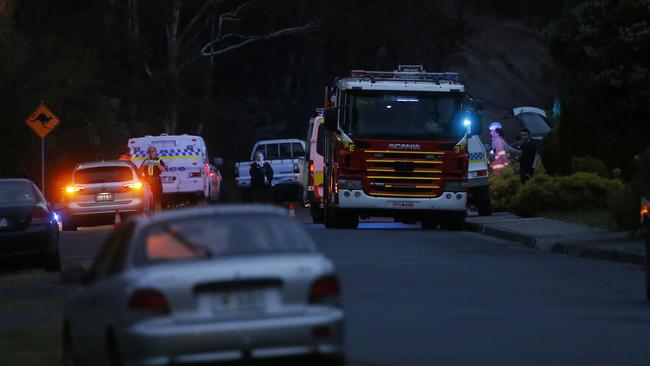 Police and emergency services responding to a report of a person struck by a vehicle on Montrose Road. Picture: ZAK SIMMONDS