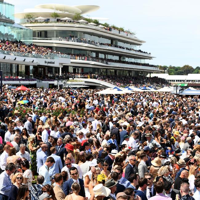 A huge crowd watches on during 2019 Melbourne Cup Day at Flemington. Picture: Getty Images