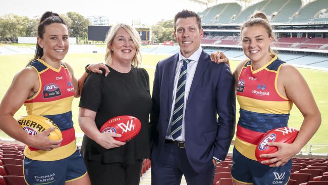 Fagan with with Crows AFLW players Jessica Sedunary and Ebony Marinoff and Workskil CEO Nicole Dwyer. Picture: AAP