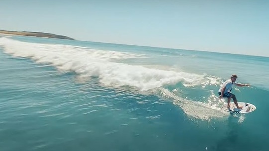 A still from a new advertising campaign video for Seiko watches filmed on Sydney's northern beaches, released in May 2023, showing Alex Hayes on a hydrofoil. Picture: Man of Many Production Studio