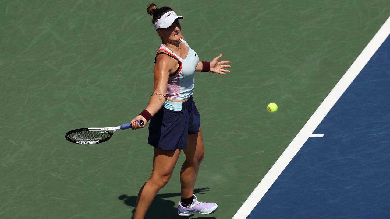 Bianca Andreescu of Canada returns a shot against Harmony Tan