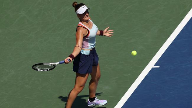 Bianca Andreescu of Canada returns a shot against Harmony Tan