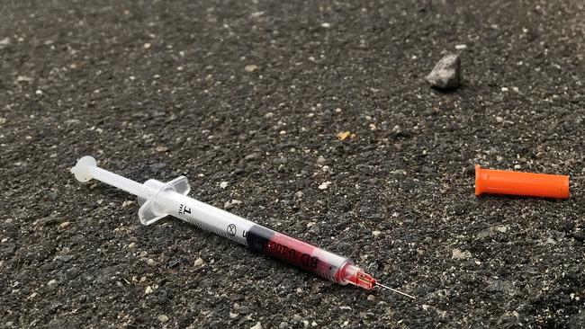 A blood-filled needle in a Richmond laneway. Picture: Nicole Garmston