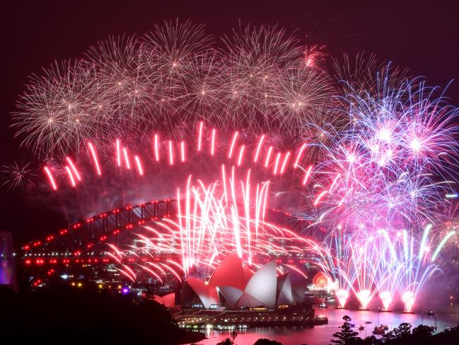 New Year's Eve 2020 midnight fireworks display over the Sydney Opera House and Harbour Bridge to usher in 2021. Picture: Toby Zerna