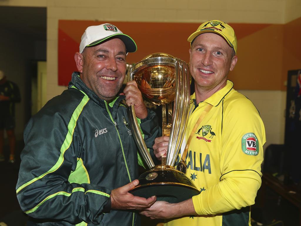 MELBOURNE, AUSTRALIA - MARCH 29: Darren Lehmann, coach of Australia, and Brad Haddin of Australia celebrate with the trophy during the 2015 ICC Cricket World Cup final match between Australia and New Zealand at Melbourne Cricket Ground on March 29, 2015 in Melbourne, Australia. (Photo by Ryan Pierse/Getty Images)