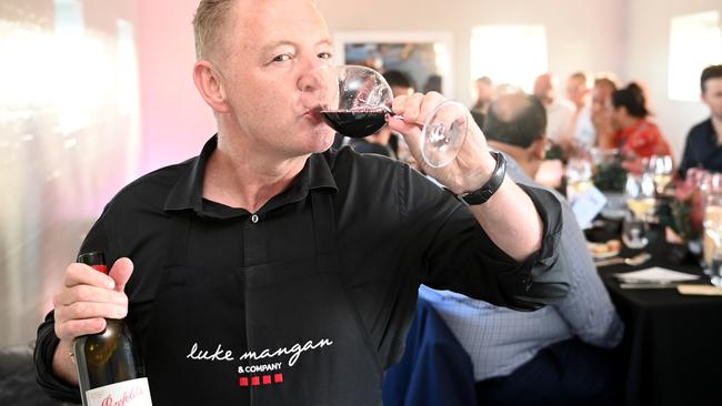 Chef Luke Mangan greets diners with a drink after they have climbed the 200 stairs. Picture: Jeremy Piper