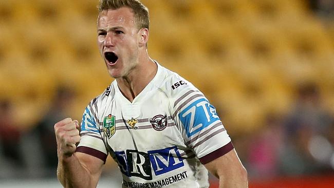 Daly Cherry-Evans celebrates a match winning field-goal.