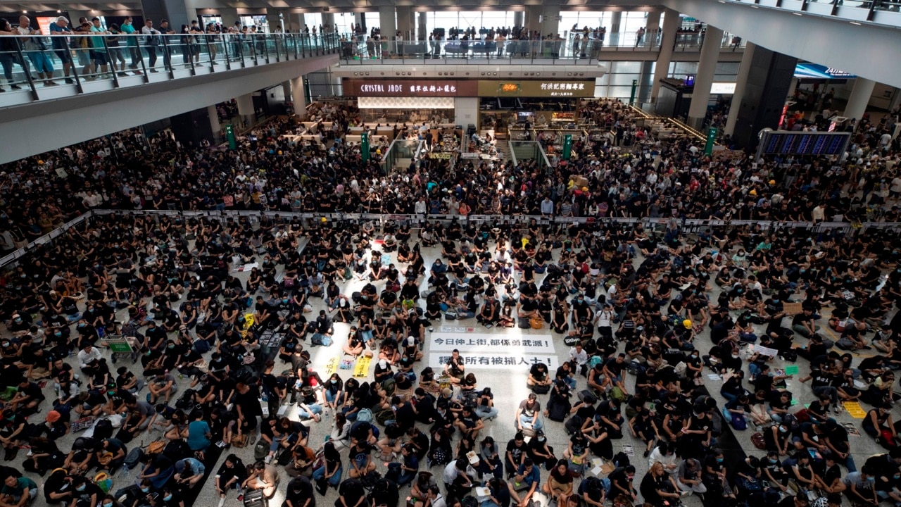 Hong Kong airport reopens after protesters swarm main terminal