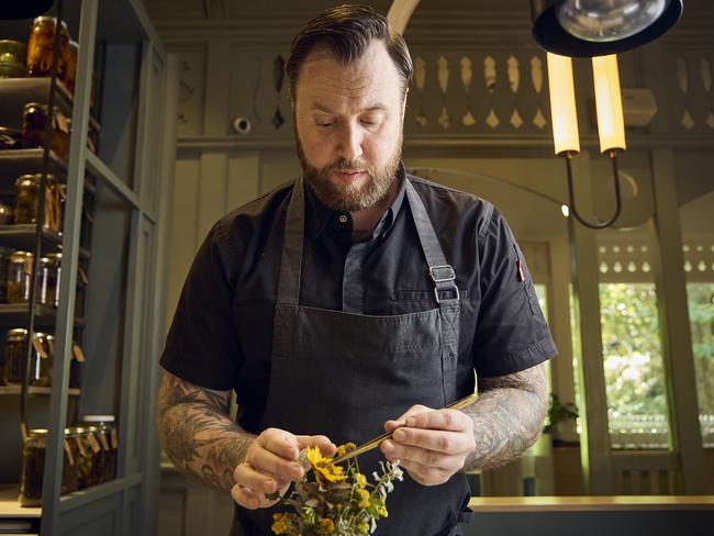 Executive chef Justin James at Restaurant Botanic, creating with nasturtium apple flower. Picture: Matt Loxton