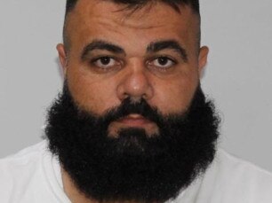 There are five warrants out for the arrest of Khaled Haouchar.