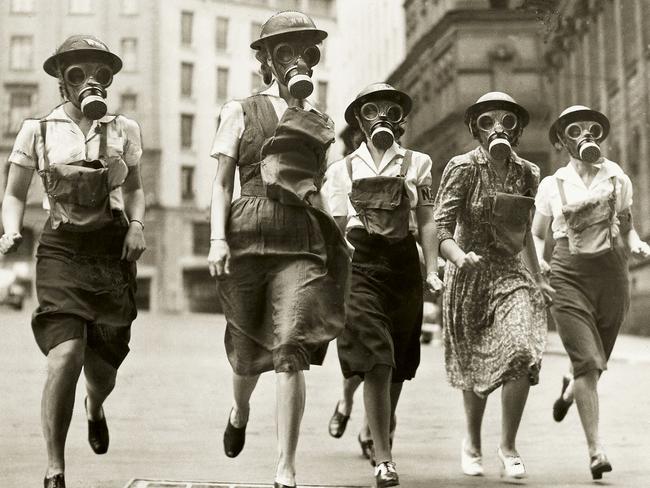 Women wearing gas masks in Sydney taking part in a competition between emergency service teams circa 1943. Picture: courtesy Museum of Sydney.