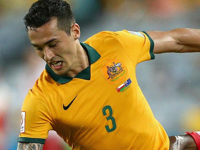 SYDNEY, AUSTRALIA - JANUARY 13: Jason Davidson of the Socceroos controls the ball during the 2015 Asian Cup match between Oman and Australia at ANZ Stadium on January 13, 2015 in Sydney, Australia. (Photo by Cameron Spencer/Getty Images)