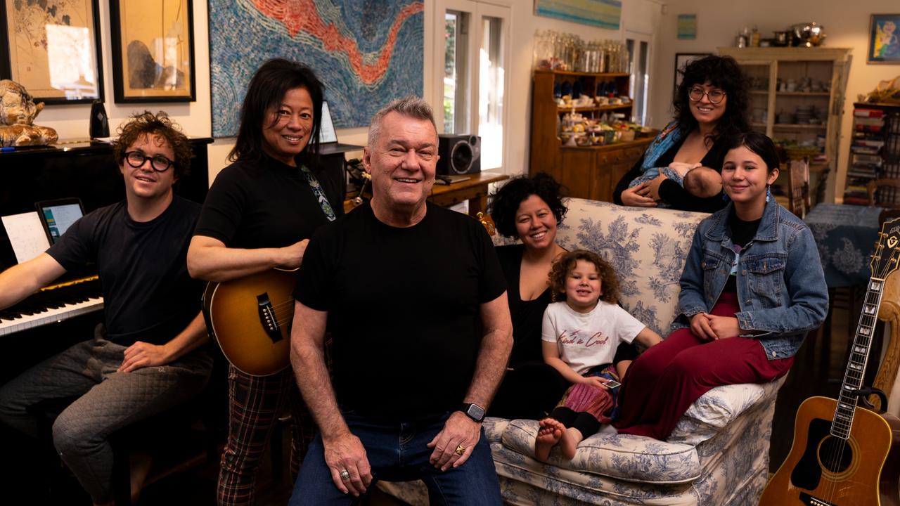 The Barnes brigade – Jane Barnes, Rosie Rodgers, Jimmy Barnes, Ruby Rodgers, Mahalia Barnes. Standing: Eliza Jane Barnes and musician husband Jimmy Metherell with their baby boy Teddy. Picture: Ben Rodgers