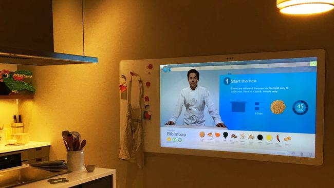 A virtual cook issues instructions at a model kitchen at Microsoft's Seattle headquarters