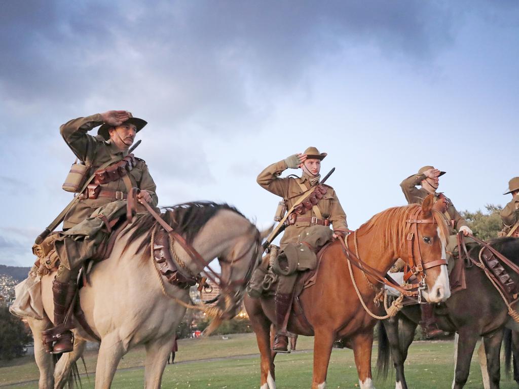 C squadron, 3rd Lighthorse Regiment, Historic Troop salutes when The Ode is played at the Anzac Day dawn service at the Hobart cenotaph. Picture: PATRICK GEE