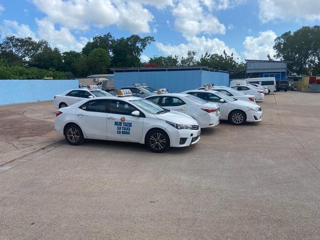 Not on the road again. Taxis in storage at the Blue Taxi Company yard because of a shortage of drivers