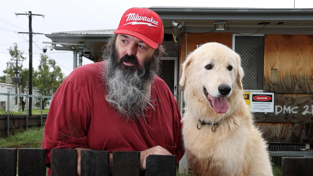 Rodger Winch with his dog Loki who helps protect his Able Smith Parade home alone with 13 cameras and numerous flood lights, youth crime in Mount Isa. Picture: Liam Kidston