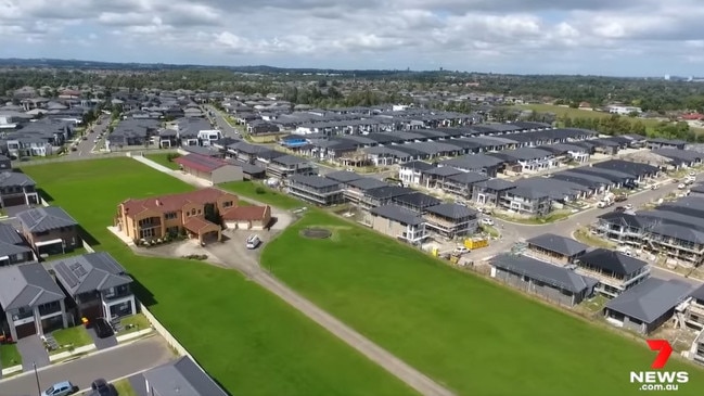 Drone shots of the property really show how much it stands out among the lines of grey two storey homes. Picture: Seven News