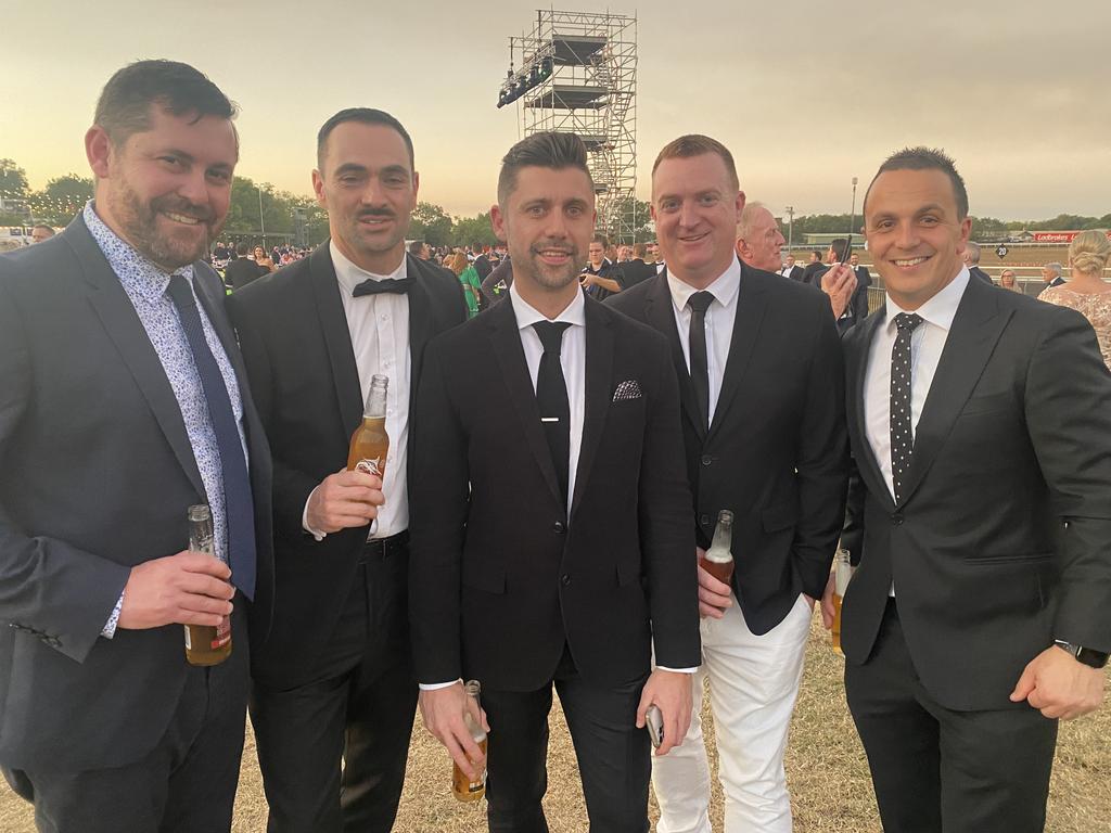 Peter Clark, Sam Parker, Leigh Kentwell, Andrew Bullock and Robbie Farrah enjoy the 2022 Darwin Cup Gala Ball. Picture: NT News