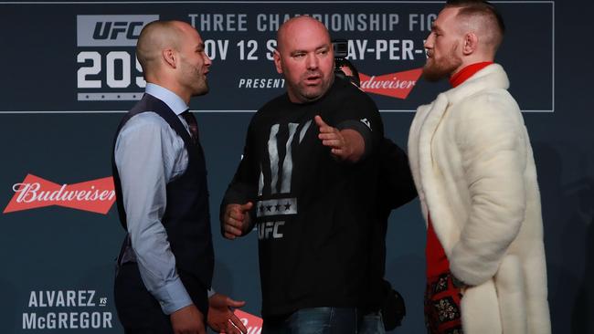 UFC president separates Eddie Alvarez and Conor McGregor during the UFC 205 press conference.