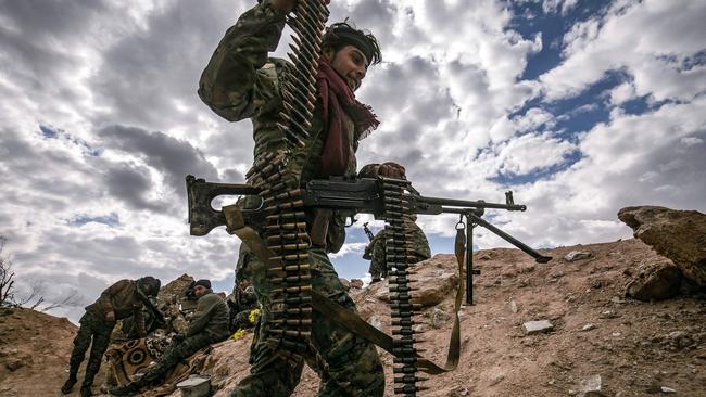 A fighter of the Syrian Democratic Forces at the front in Baghouz. Picture: AFP