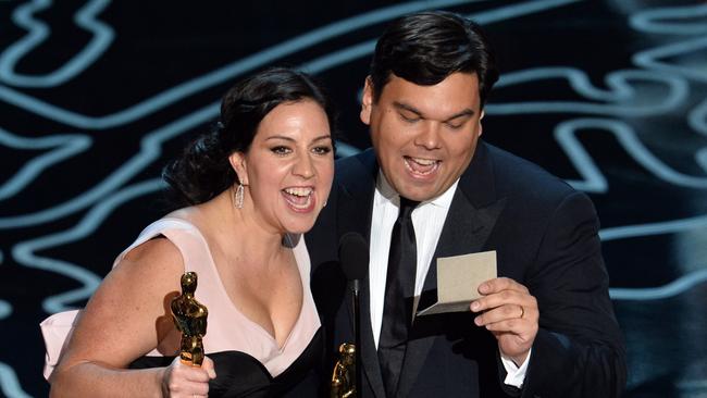 Songwriters Kristen Anderson-Lopez (L) and Robert Lopez accept the Best Achievement in Music Written for Motion Pictures, Original Song award for 'Let It Go' from 'Frozen' onstage during the Oscars on March 2, 2014 in Hollywood. Picture: Kevin Winter/Getty Images