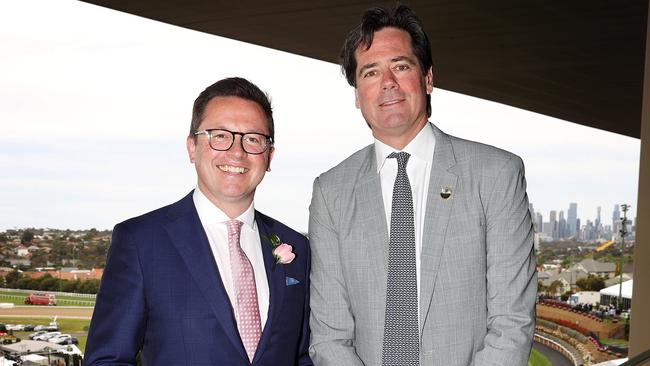 Minister Anthony Carbines with Gillon McLachlan at last year’s Cox Plate.