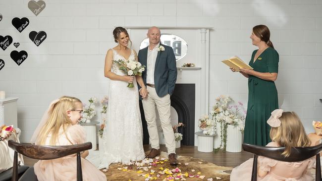 A couple being married at the Vegas-themed chapel.