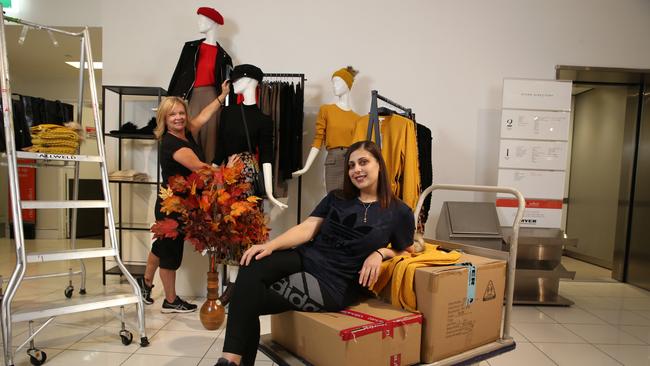 Myer merchandise operations manager Mariam Haragli, front, and visual merchandising stylist Kim Howlett at Myer in Bankstown in Sydney. Picture: Britta Campion