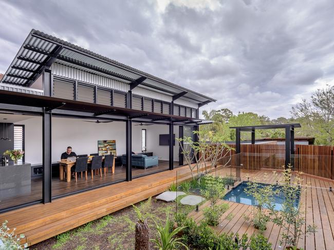 The main living area faces onto a deck and plunge pool. Picture: The Guthrie Project