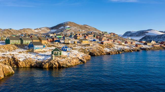 We wake and pull up our blockout blinds to a clear morning and a view of Ittoqqortoormiit. 