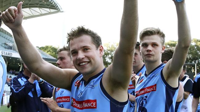 SANFL - Preliminary Final - Sturt v Eagles at Adelaide Oval. Guy Page and Steven SLimming wave to the crowd as they walk off after the win. Picture Sarah Reed