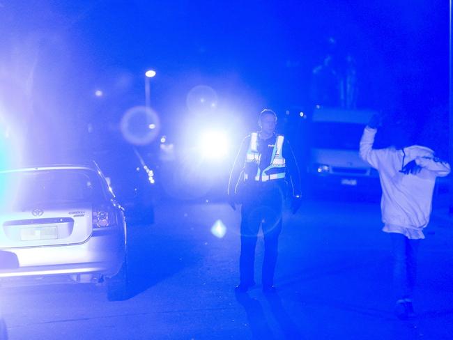 Police had their hands full with wayward teens the night the Herald Sun rode with them. Picture: Valeriu Campan