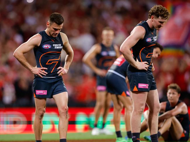 Giants players look dejected after the final siren. Picture: Dylan Burns/AFL Photos via Getty Images