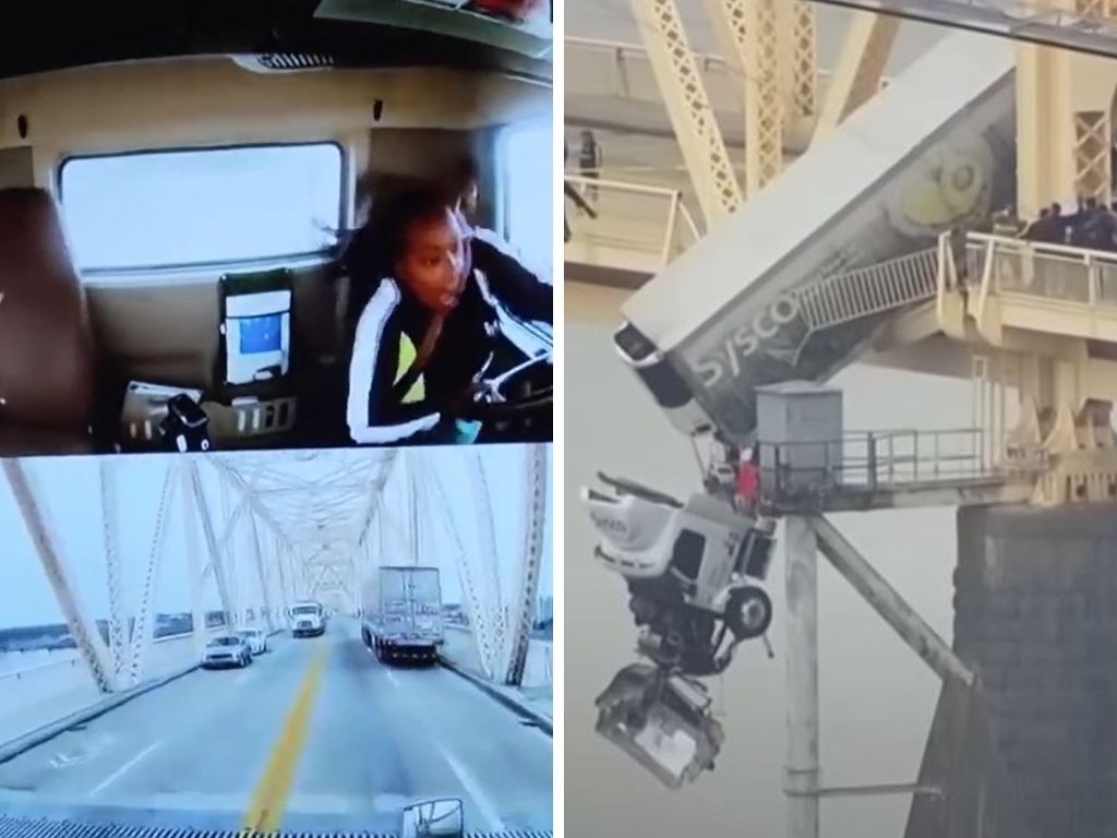 Horrifying footage shows the moment a truck was left dangling from a US bridge after a crash.