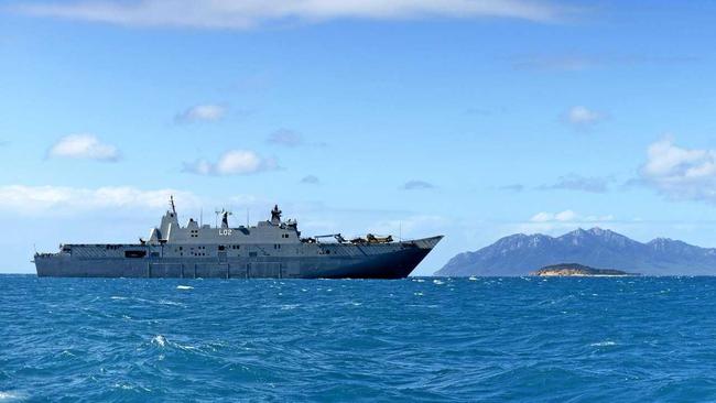 HMAS Canberra anchored off the coast of Kings Beach during Operation Sea Explorer in 2018. Picture: Daniel Wetzel