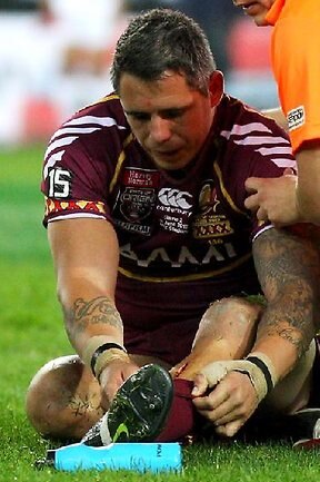 State of Origin II, 2012: Queensland forward Corey Parker suffers a gash to his leg and has to go off. Picture: Gregg Porteous