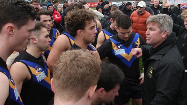 Old Carey coach Michael Tarrant rallies the troops. Picture: David Crosling