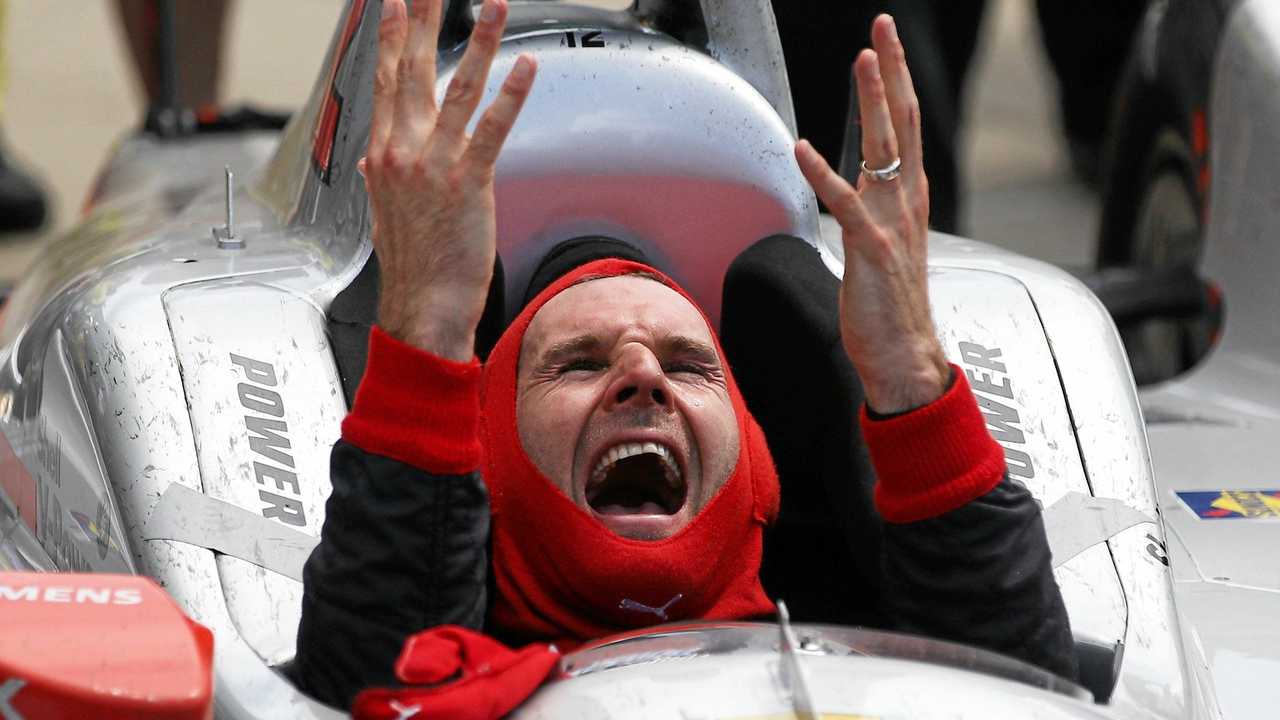 MAGIC MOMENT: Toowoomba's Will Power celebrates winning his first ever Indianapolis 500 at the Indianapolis Motor Speedway. Picture: Chris Graythen