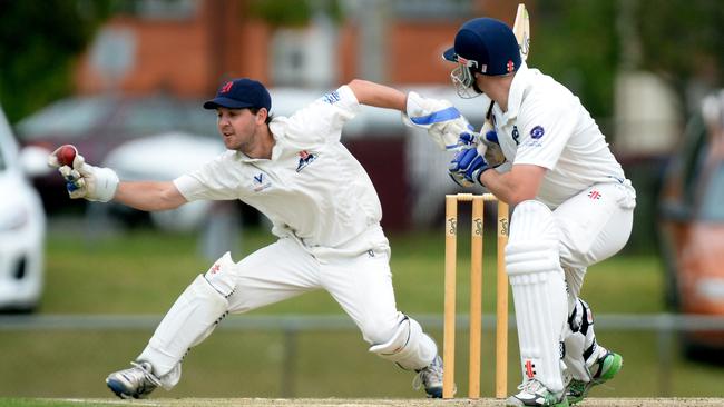 Rob Hearn wicket keeping for Dandenong in 2013. Picture: Chris Eastman