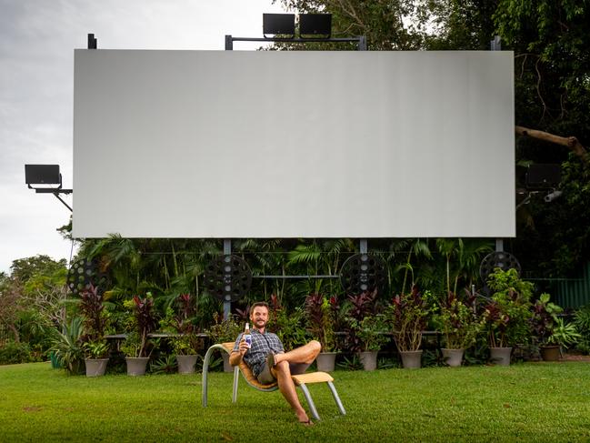 Darwin's iconic Deckchair Cinema tickets went on sale on Thursday, with their restart date now confirmed after coronavirus restrictions are lifted. General Manager James Parker is pictured in front of the cinema screen as they prepare for the reopening. Picture: Che Chorley