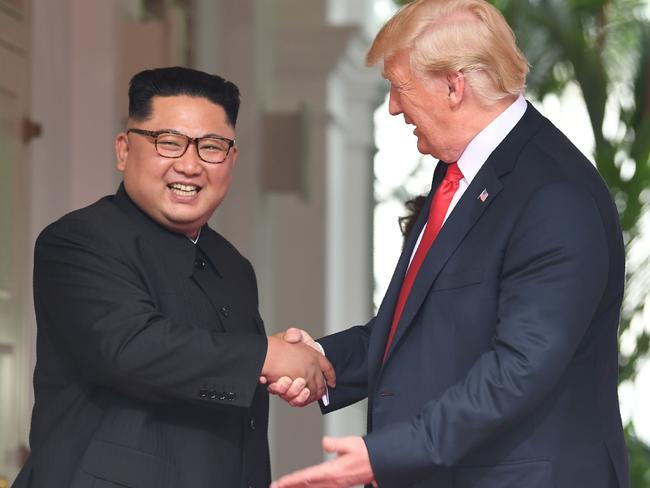 The pair shared a 13-second handshake upon meeting. Picture: AFP