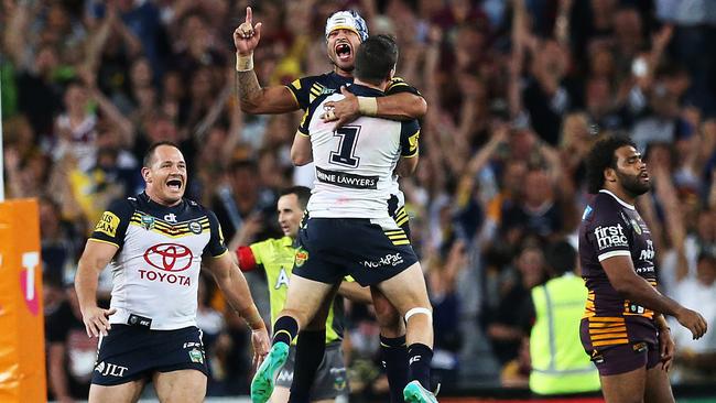 Johnathan Thurston kicks the winning field goal for the Cowboys in golden point during the 2015 NRL grand final. Picture: Phil Hillyard