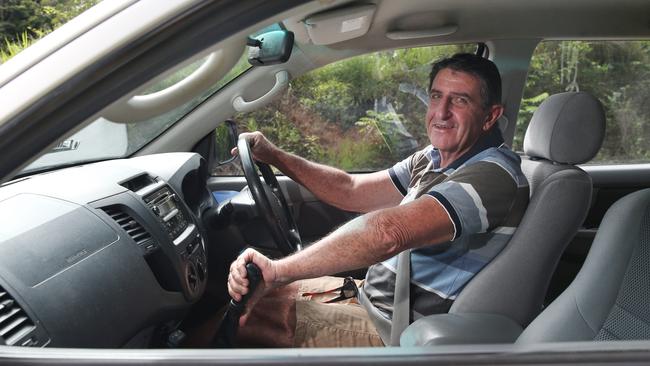 Kuranda resident Chris Basson waits at the traffic lights on the Kuranda side to cross the bridge. Picture: Brendan Radke