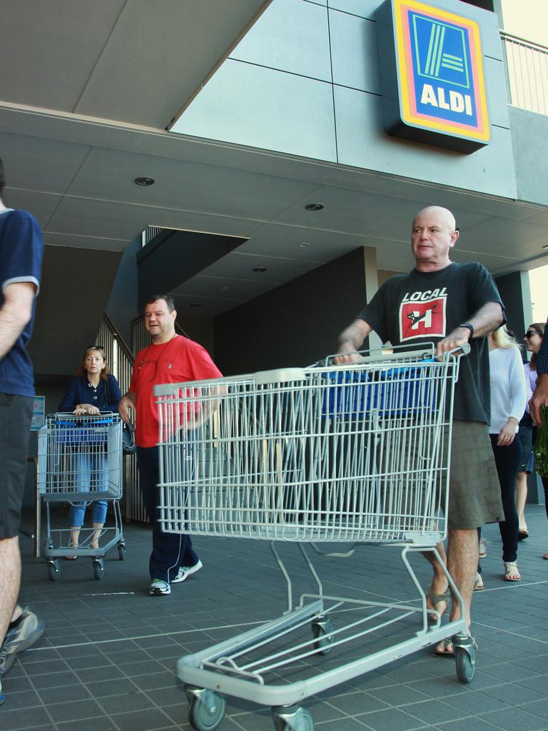 People line up in hopes of saving money. Photo: Claudia Baxter