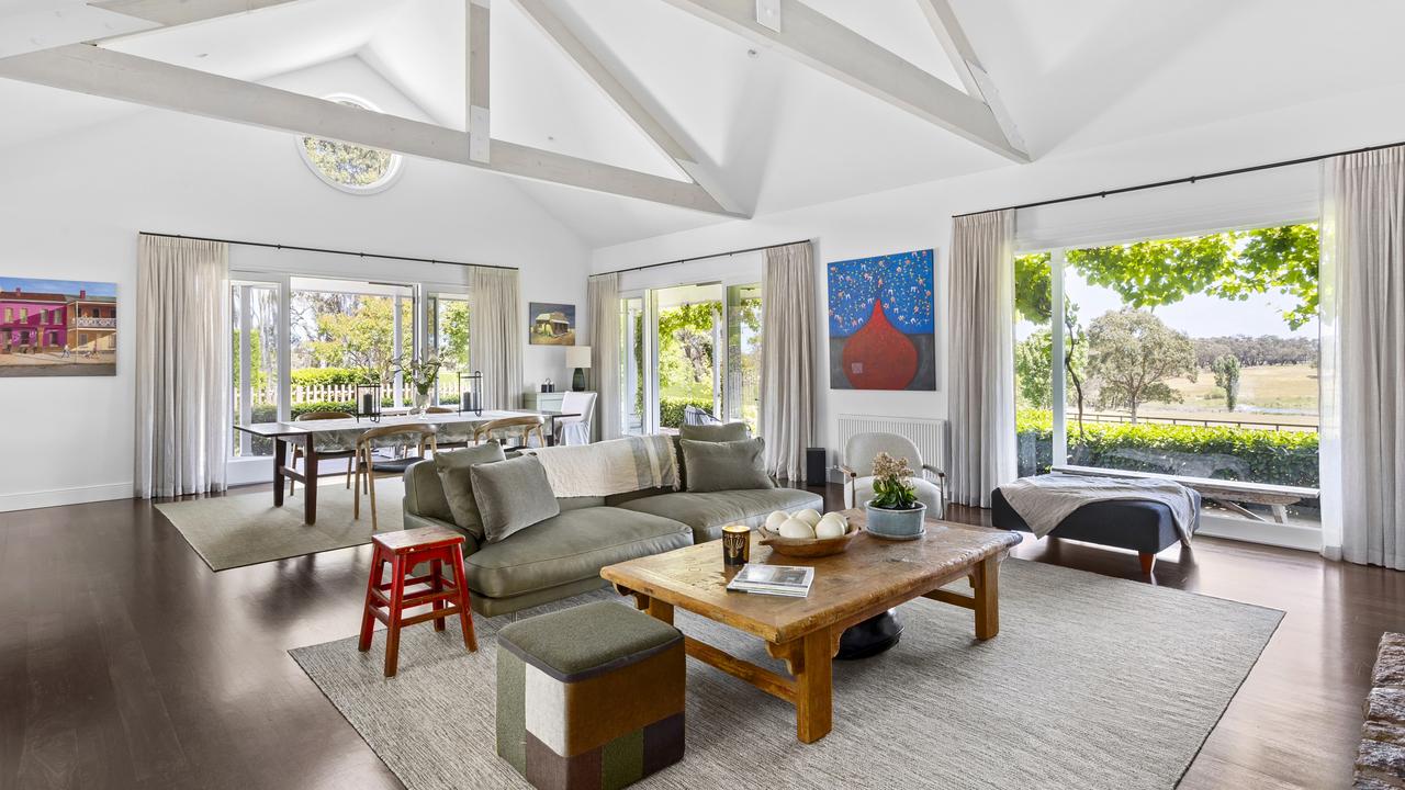 Soaring ceilings in the open plan living and dining area.