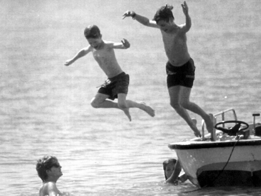 The three royals frolicked at Caribbean island of Navis. Picture: AP.