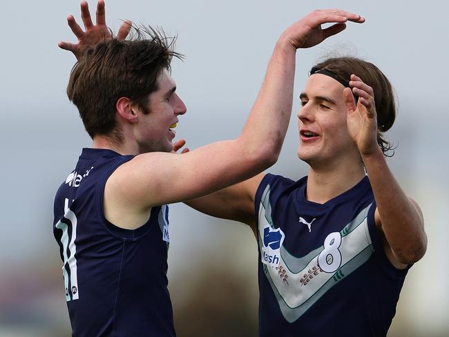 ADELAIDE, AUSTRALIA - June 30: Christian Moraes of Victoria Metro celebrates his goal with Murphy Reid of Victoria Metro during the 2024 Marsh AFL Championships U18 Boys match between South Australia and Victoria Metro at Alberton Oval on June 30, 2024 in Adelaide, Australia. (Photo by Sarah Reed/AFL Photos via Getty Images)