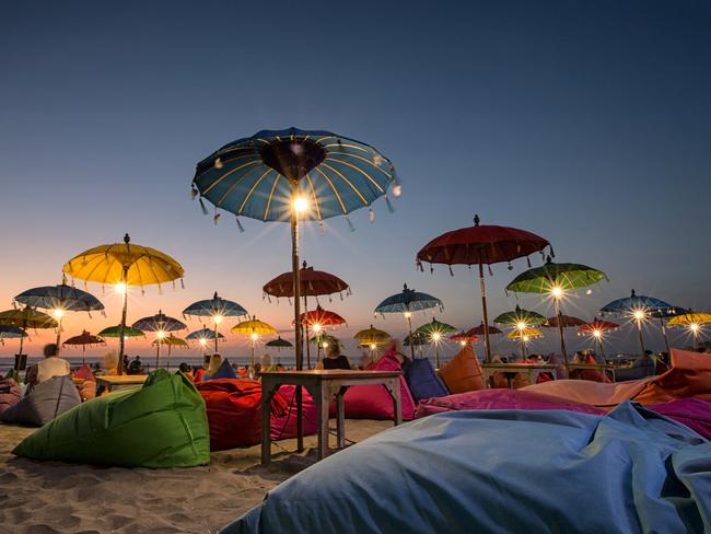 Sunset scene of Seminyak Beach Bali, Indonesia. Features a relaxed coastal ambiance. Kuta, Legian and Seminyak are great places to hang out with its cafes, beaches and restaurants, live music venue, chill out sessions or entertainment.Escape 20 August 2023Why I travelPhoto - Getty Images